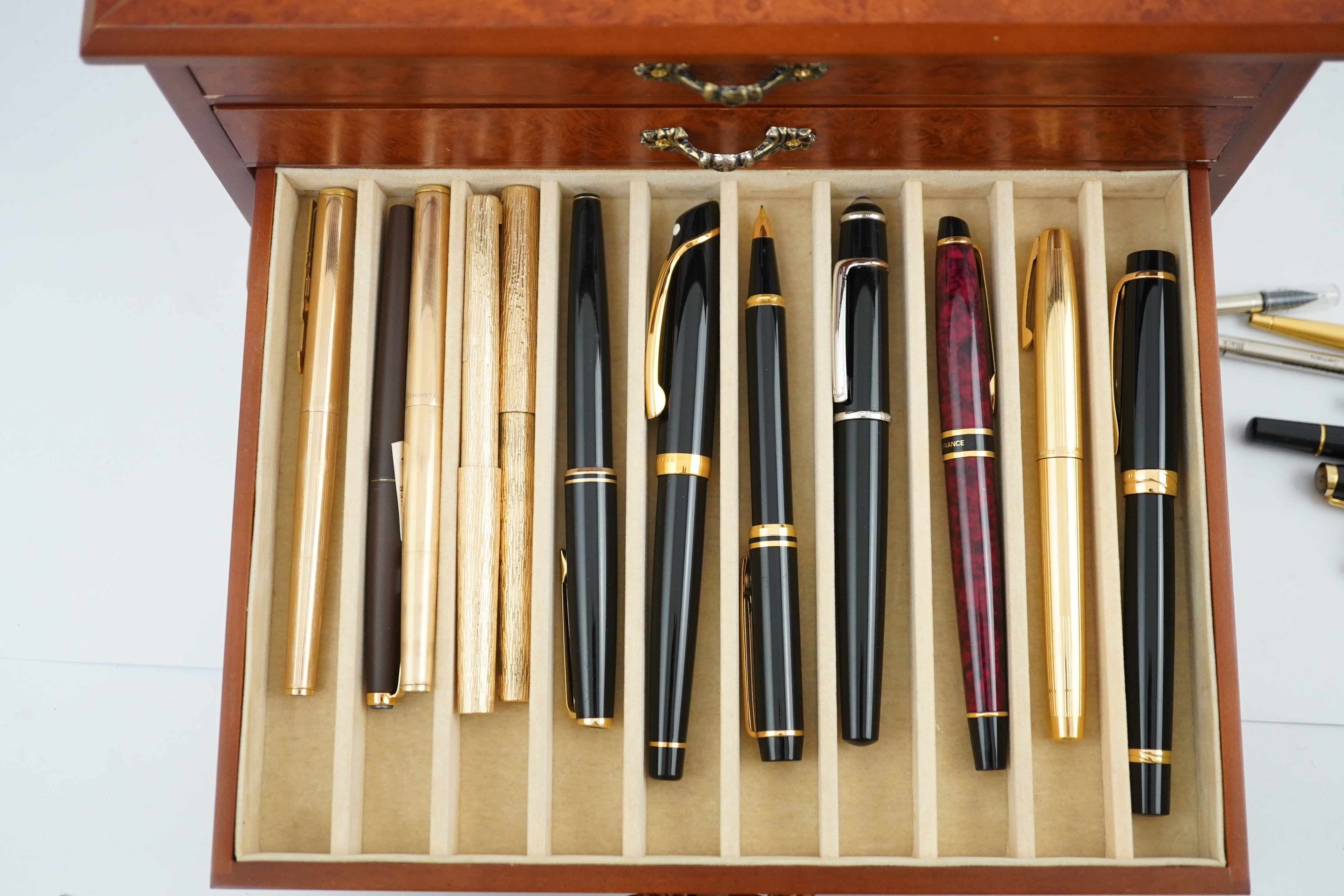 A large quantity of pens etc. and collector's cabinet